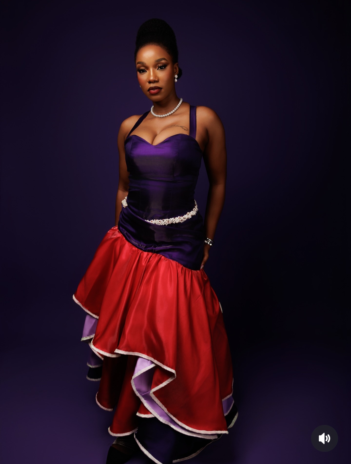 RIAALE purple corset gown with red ruffled skirt