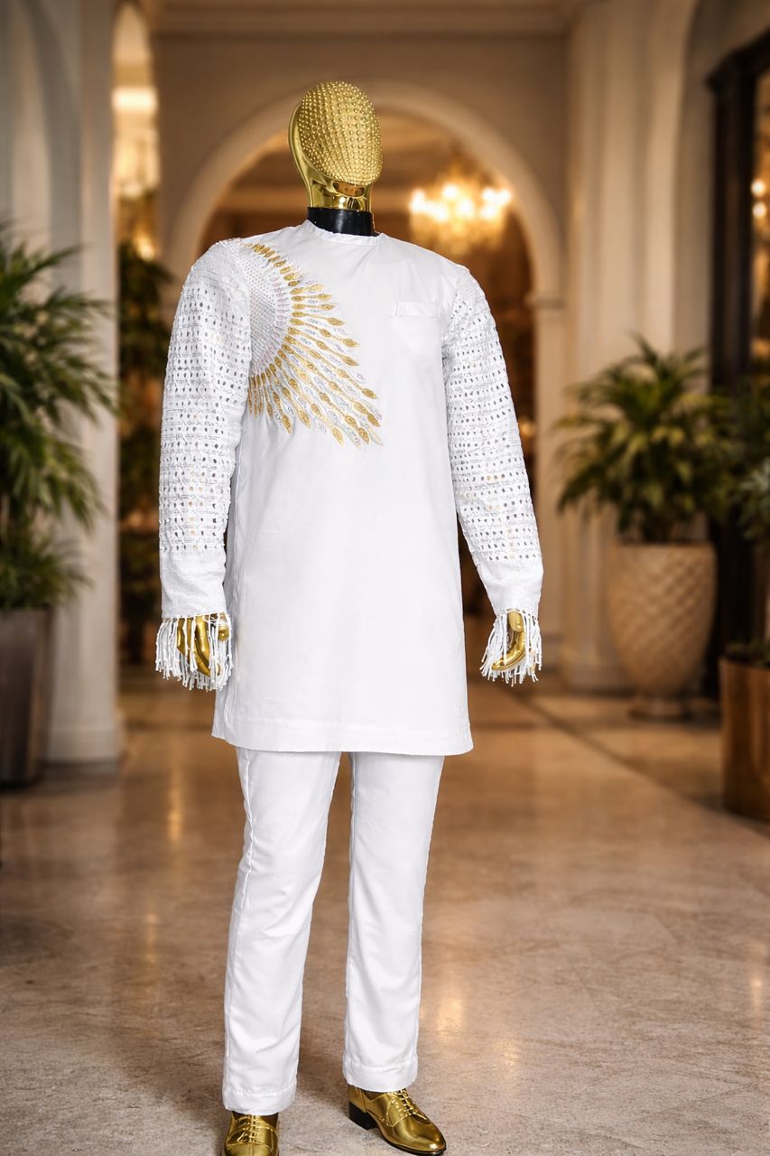 RIAALE white kaftan with gold sunburst embellishment